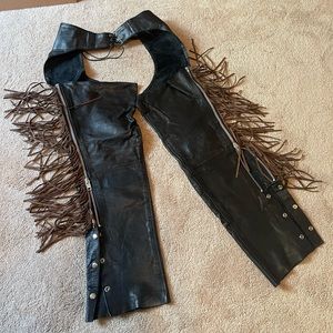 Black leather ladies chaps with brown fringe trim
